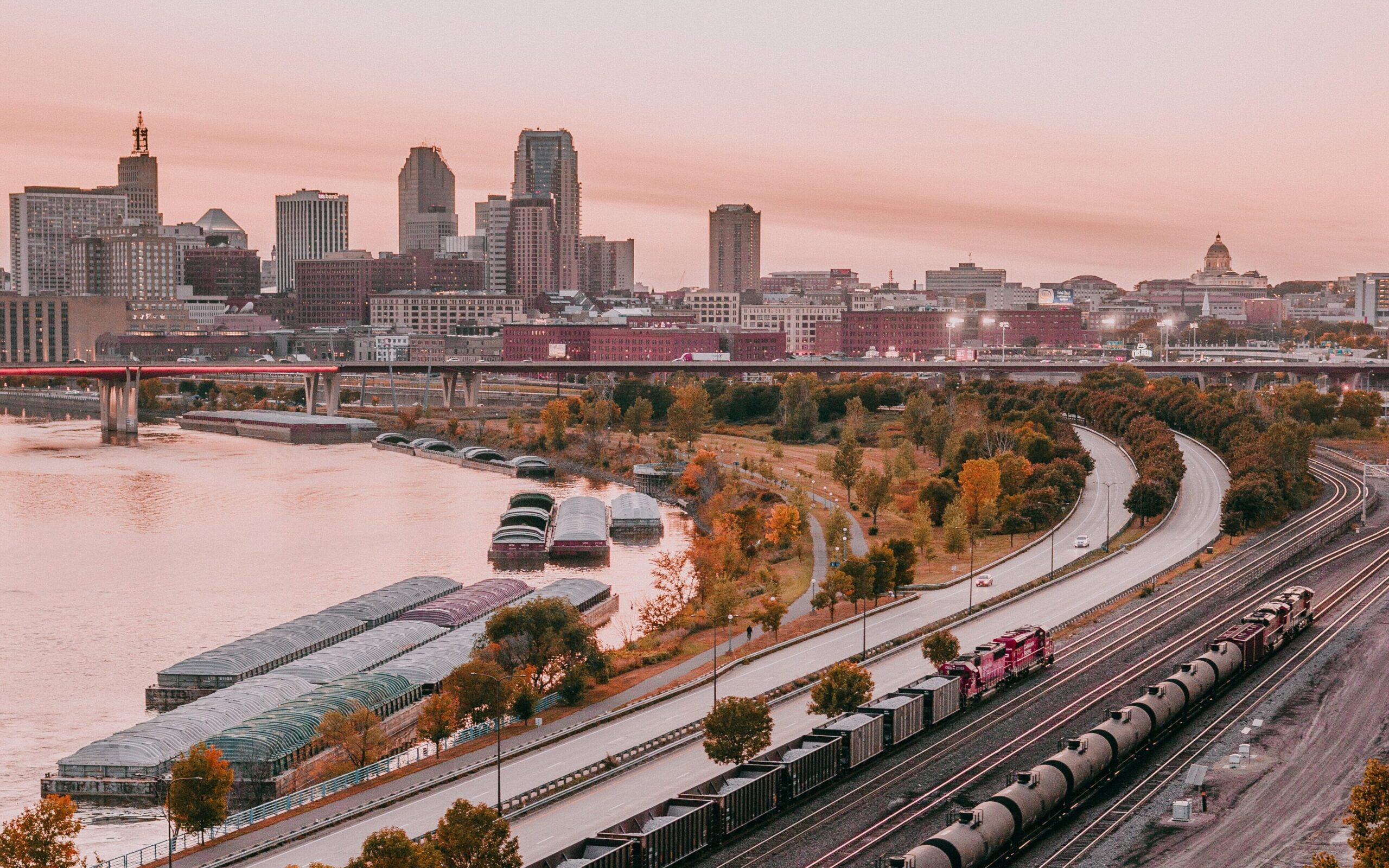 Skyline of Saint Paul with barges, roadways and trains